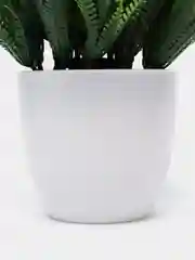 Салатовый искусственный цветок в горшке