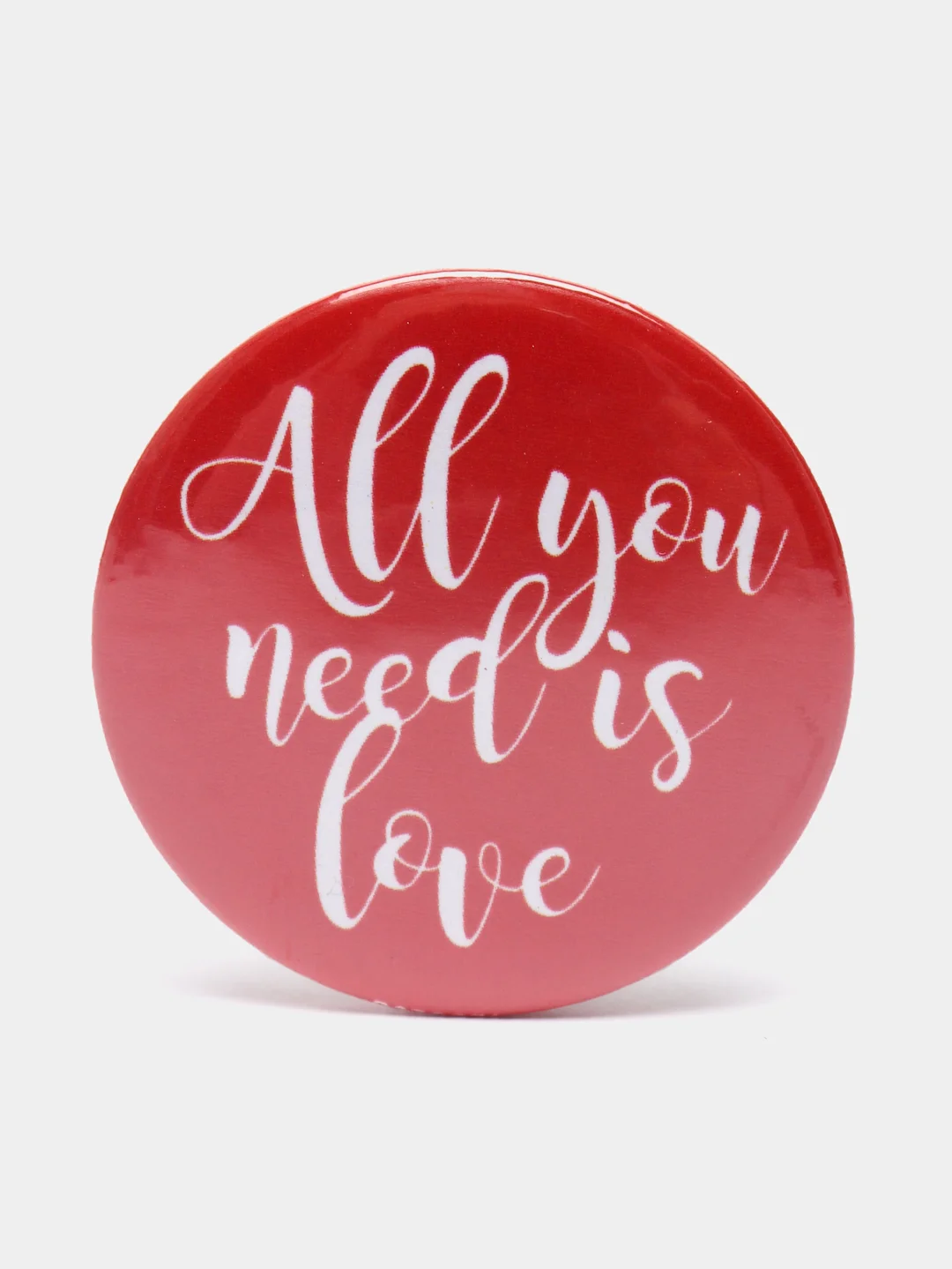 Красный значок "All you need is love"