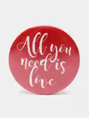 Красный значок "All you need is love"