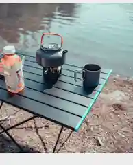 Черный складной туристический стол