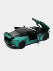 Зеленый металлическая машинка Aston Martin 1:22