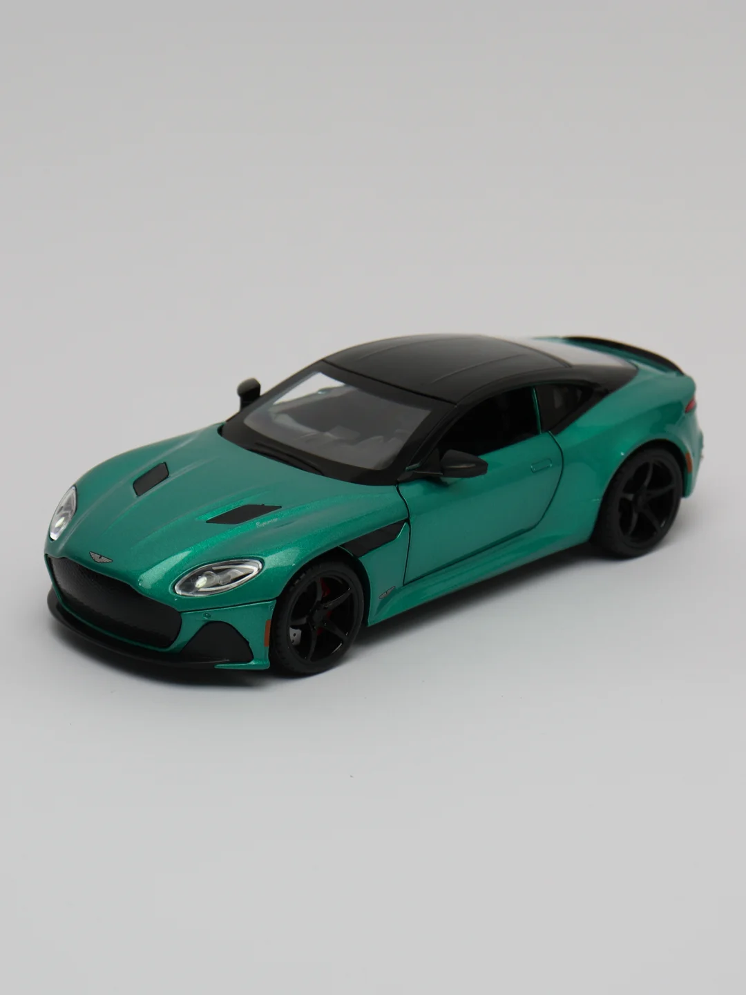 Зеленый металлическая машинка Aston Martin 1:22