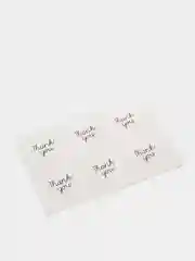 Круглая белая наклейка с надписью "Thank You"