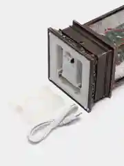Зеленый новогодний шар со снегом