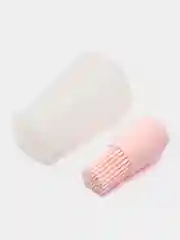 Розовый кисточка для масла с крышкой.