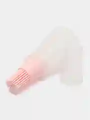 Розовый кисточка для масла с крышкой.