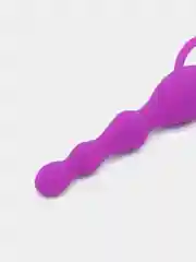 Розовый вибратор анальный