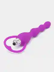 Розовый вибратор анальный