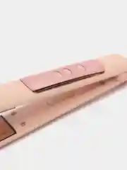 Розовый выпрямитель для волос