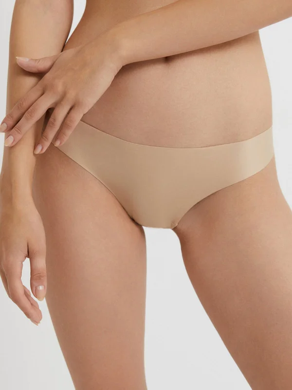 Бежевый трусы стринги с обрезным краем женские  InfinityLingerie