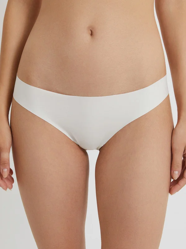 Молочный трусы стринги с обрезным краем женские  InfinityLingerie