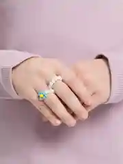 Кольцо из бисера "Ромашки"