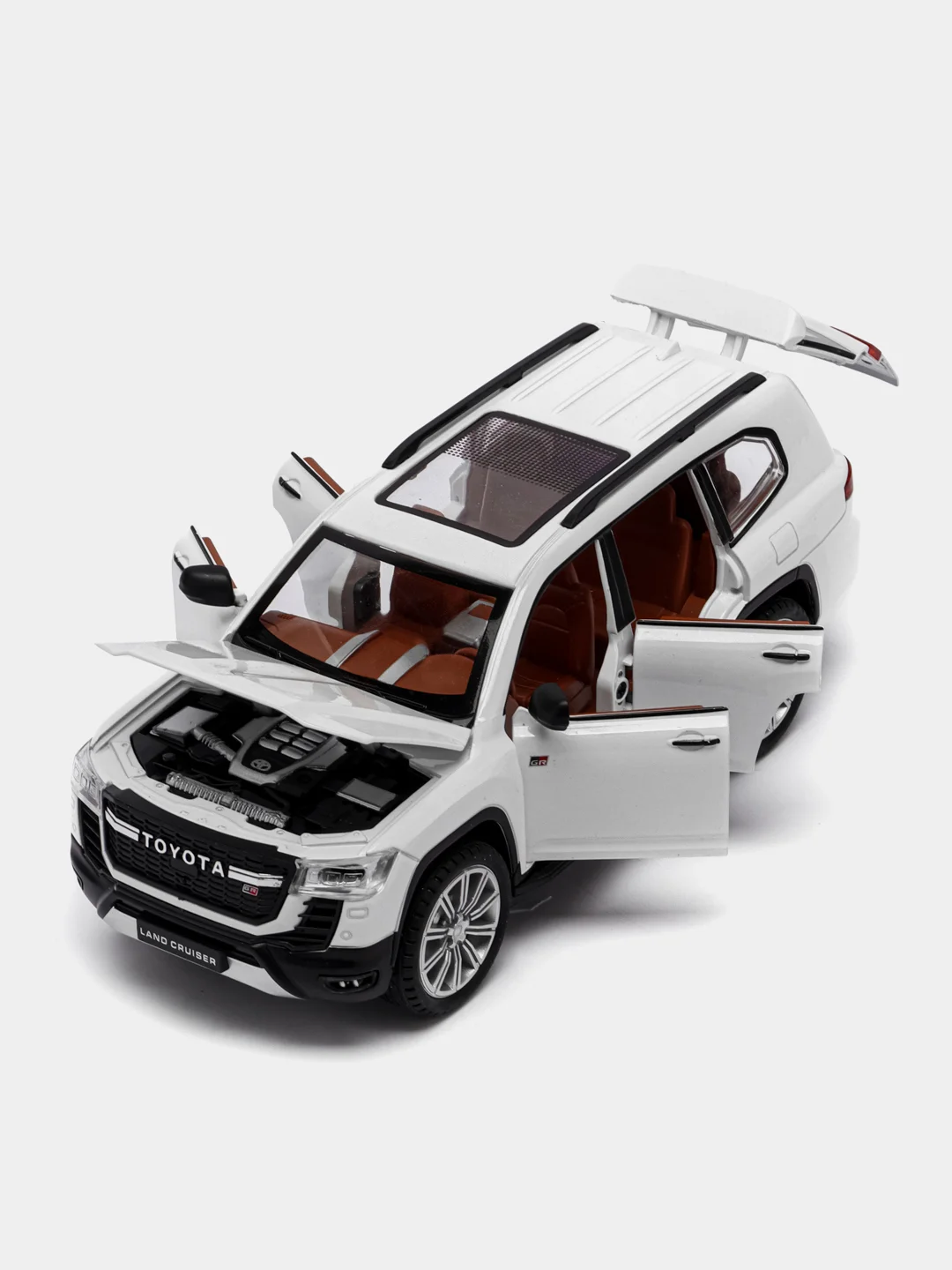 Белый металлическая модель Toyota Land Cruiser 300 в масштабе 1:24