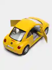 Желтый металлическая машинка Kinsmart "Volkswagen Beetle New", 1:32 KT5028D
