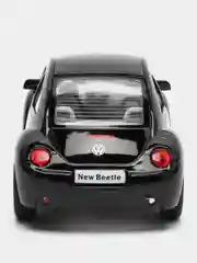 Черный металлическая машинка Kinsmart "Volkswagen Beetle New", 1:32 KT5028D