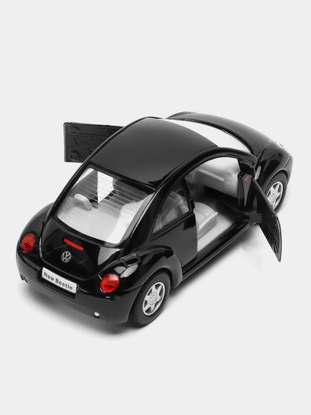 Черный металлическая машинка Kinsmart "Volkswagen Beetle New", 1:32 KT5028D