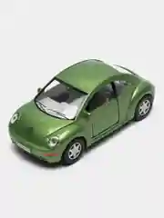 Зеленый металлическая машинка Kinsmart "Volkswagen Beetle New", 1:32 KT5028D