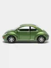 Желтый металлическая машинка Kinsmart "Volkswagen Beetle New", 1:32 KT5028D