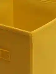 Желтый коробка для хранения вещей