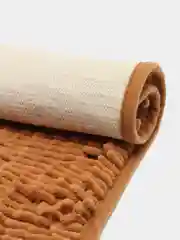 Бежевый коврик для ванной