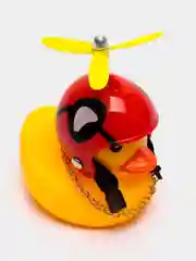 Медный утка в шлеме в машину