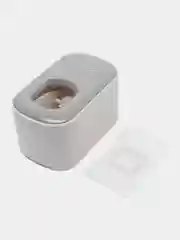 Серый настенный дозатор для зубной пасты