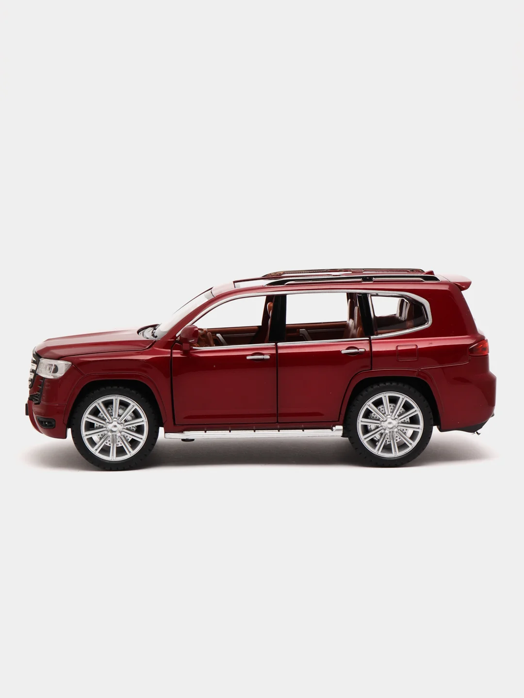 Красный модель автомобиля Toyota Land Cruiser 300