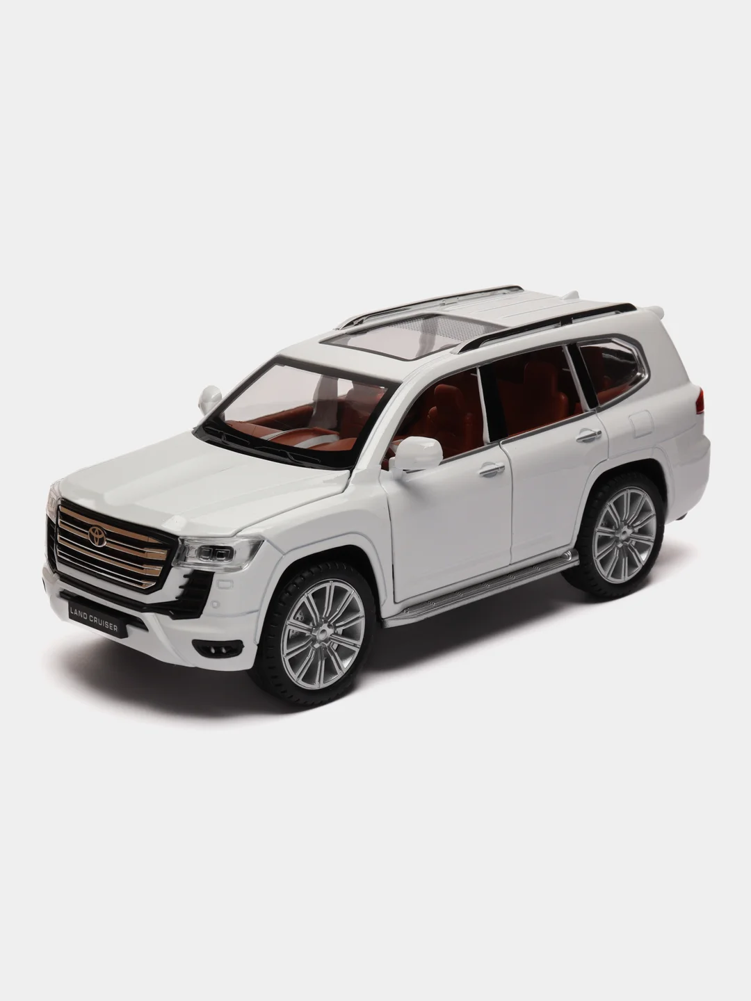 Белый модель автомобиля Toyota Land Cruiser 300