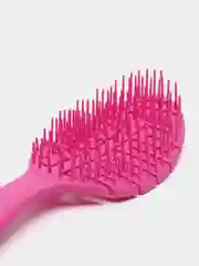 Розовый расческа