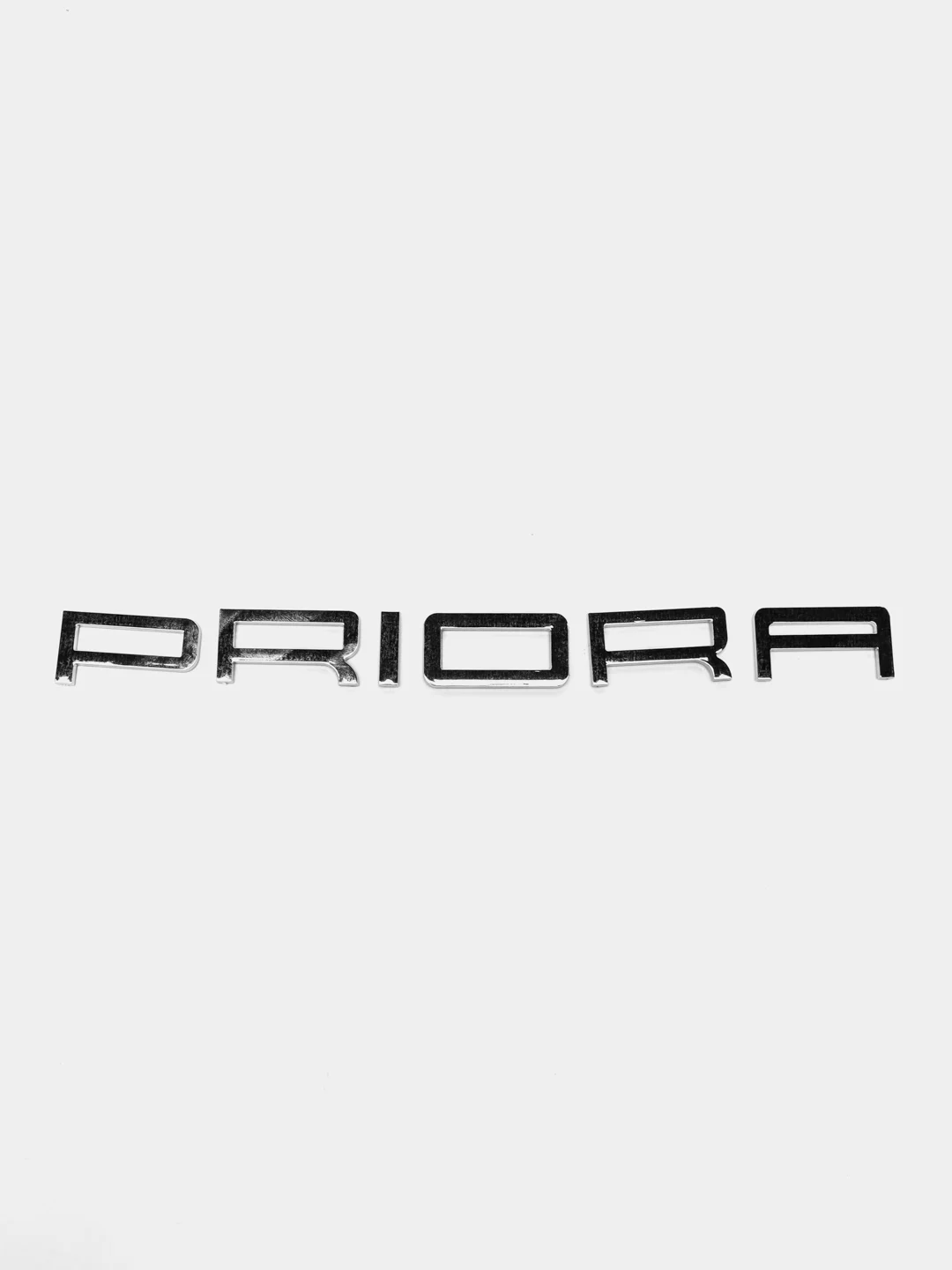 Серый металлик орнамент-шильдик на багажник Lada Granta PRIORA