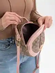 Розовый круглая женская сумка