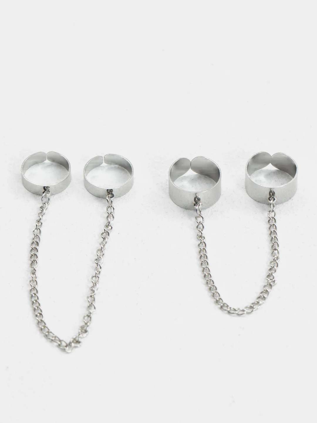 Серебряный комплект из 4-х колец с длинными цепями