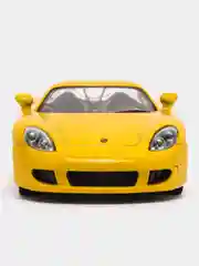 Желтый металлическая машинка инерционная  Porsche Carrera GT KT5081D Kinsmart 1:36