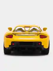 Желтый металлическая машинка инерционная  Porsche Carrera GT KT5081D Kinsmart 1:36