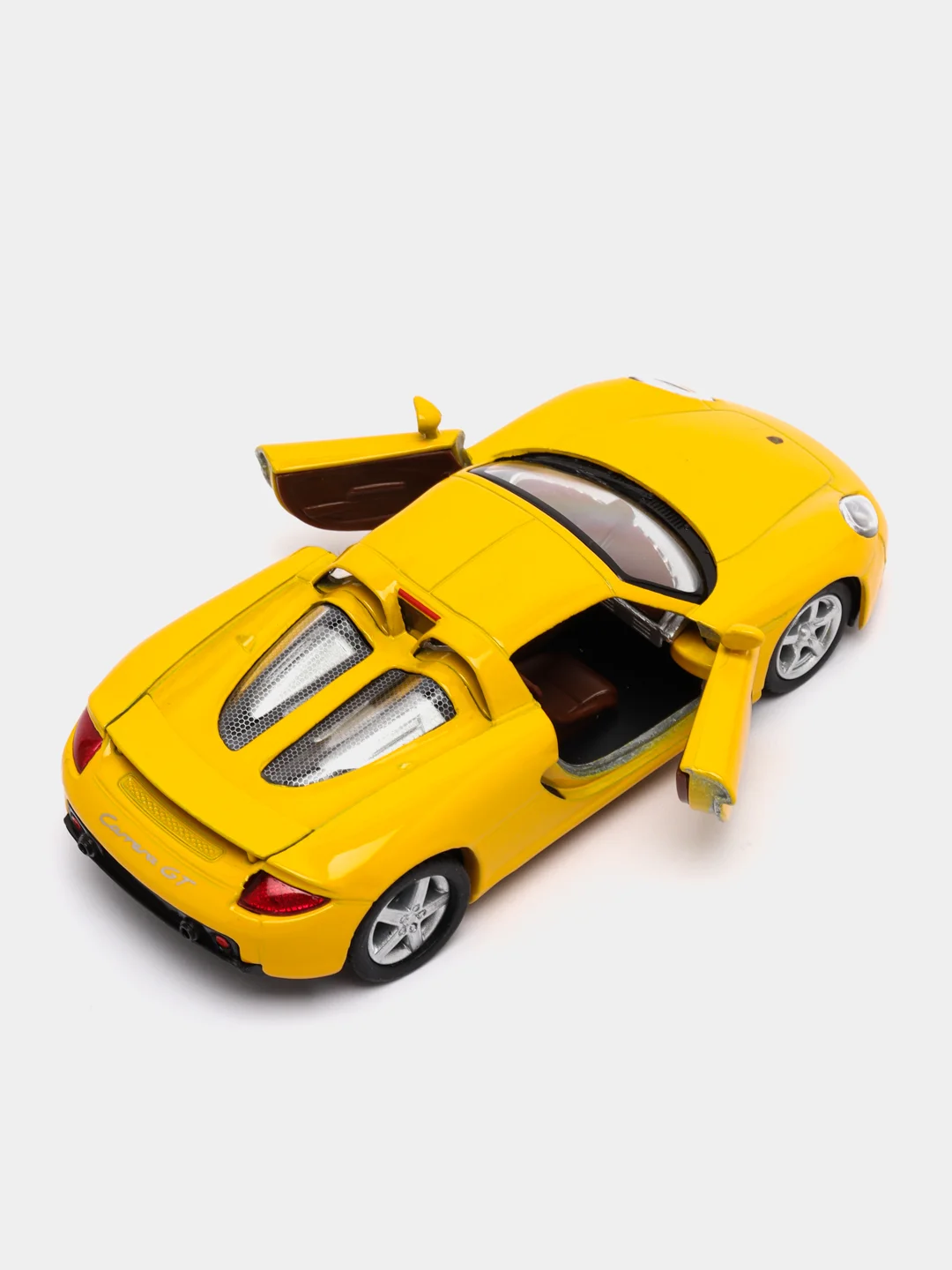 Желтый металлическая машинка инерционная  Porsche Carrera GT KT5081D Kinsmart 1:36