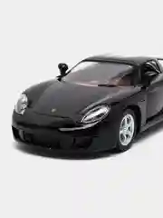 Черный металлическая машинка инерционная  Porsche Carrera GT KT5081D Kinsmart 1:36