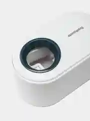 Белый дозатор для зубной пасты настенный
