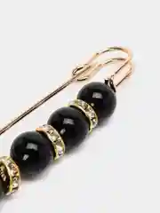Черный брошь булавка