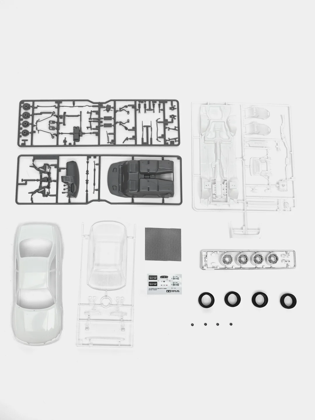 Сборная модель машинка Tamiya 24145 1/24 Nissan Skyline GT-R V-Spec (R33) sports car