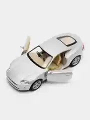 Серебряный машинка металлическая, инерционная, Jaguar XK Coupe KT5321D 1:38 KINSMART