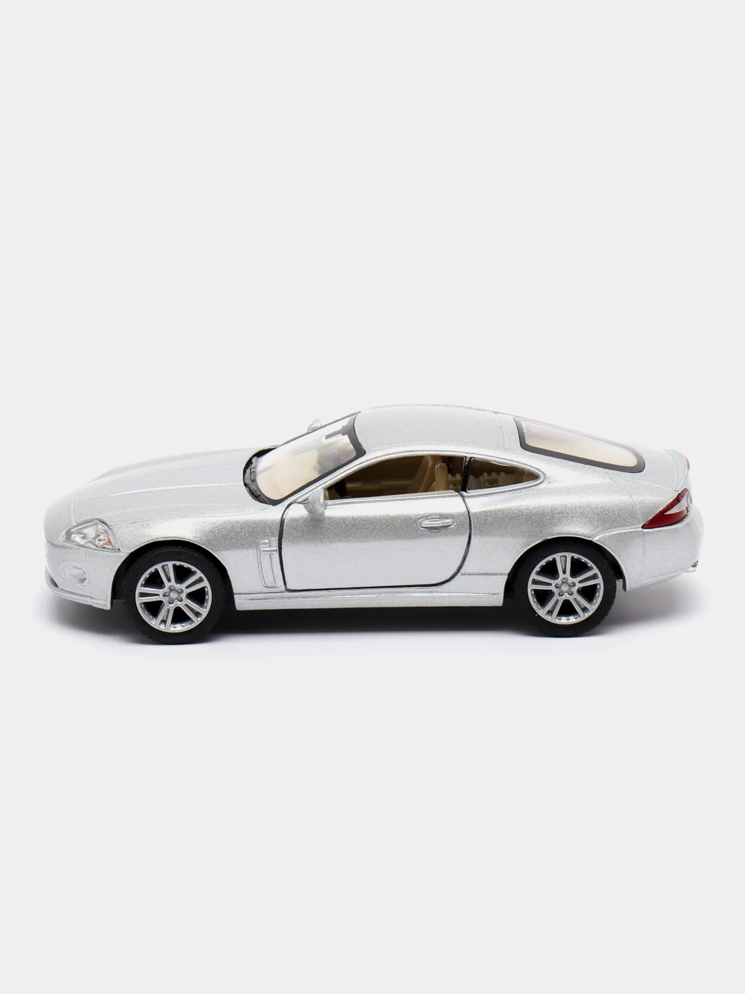 Серебряный машинка металлическая, инерционная, Jaguar XK Coupe KT5321D 1:38 KINSMART