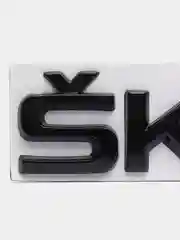 Черный орнамент-шильдик металлический SKODA / RAPID