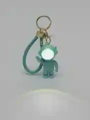 Бирюзовый брелок для рюкзака и ключей "Космонавт" с подсветкой