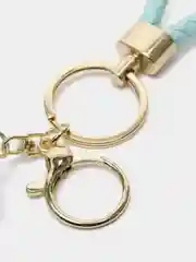 Бирюзовый брелок для рюкзака и ключей "Космонавт" с подсветкой