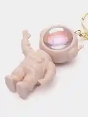 Розовый брелок для рюкзака и ключей "Космонавт" с подсветкой