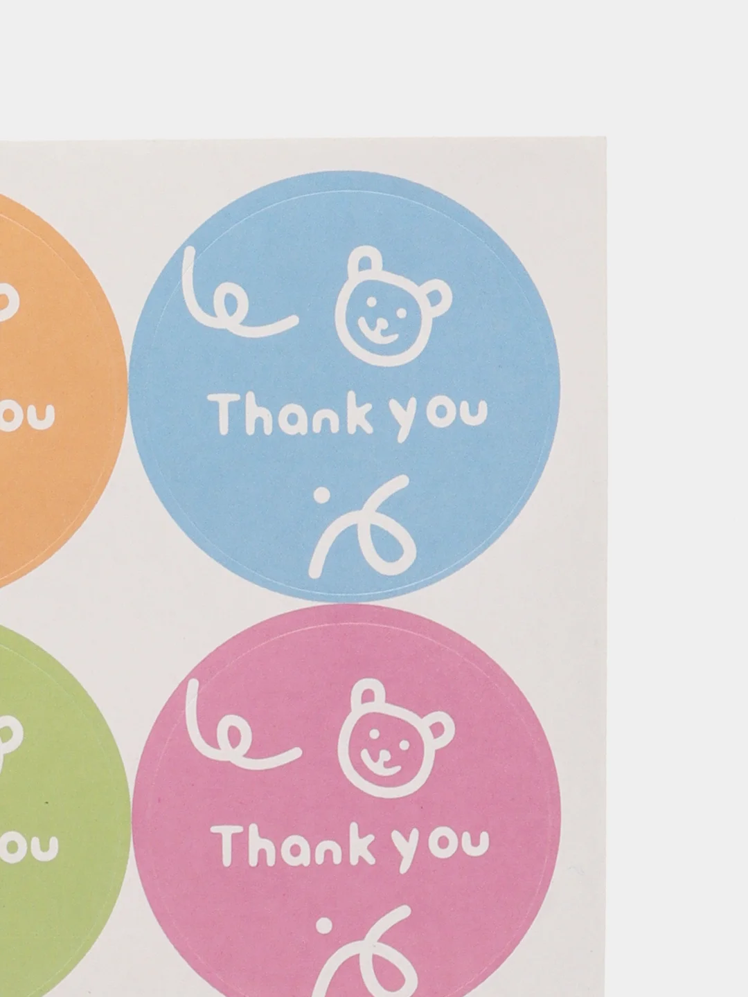 Круглые цветные наклейки с надписью "Thank You"
