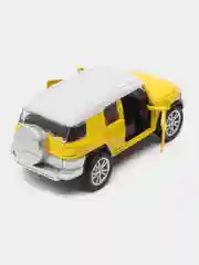 Желтый металлическая коллекционная машинка Toyota FJ Cruiser
