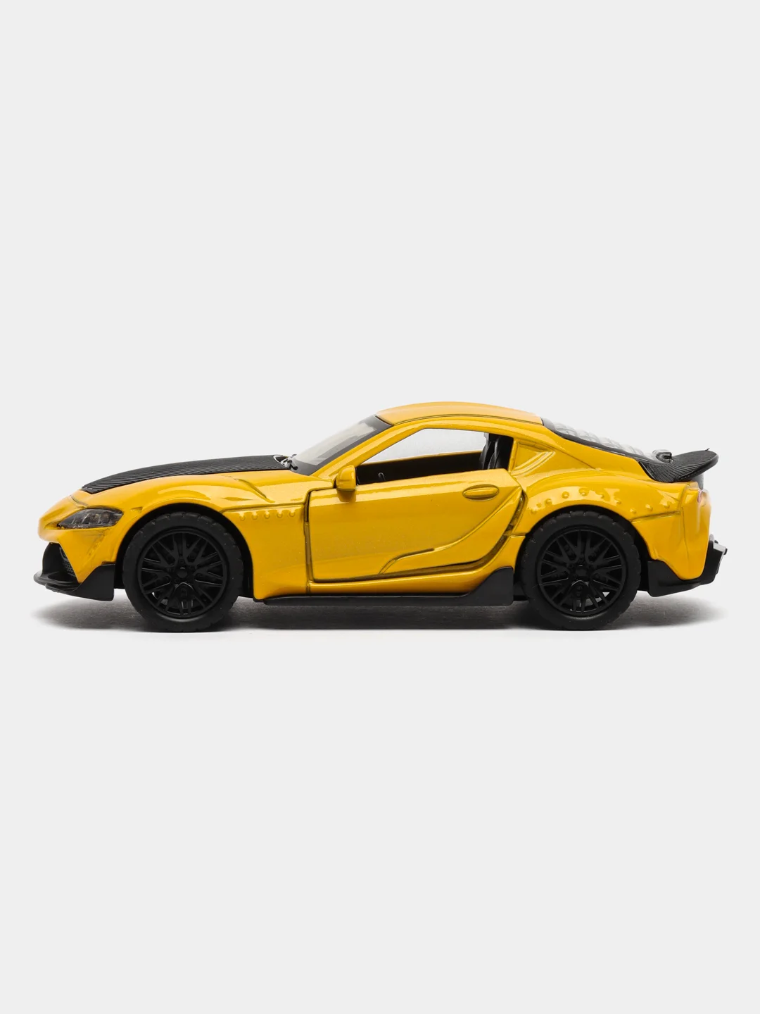 Желтый металлическая коллекционная машинка Toyota Supra