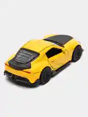 Желтый металлическая коллекционная машинка Toyota Supra