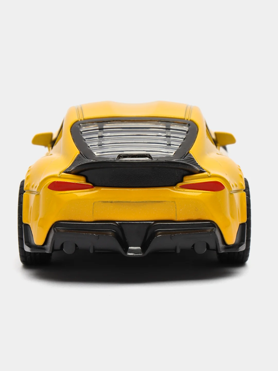 Желтый металлическая коллекционная машинка Toyota Supra